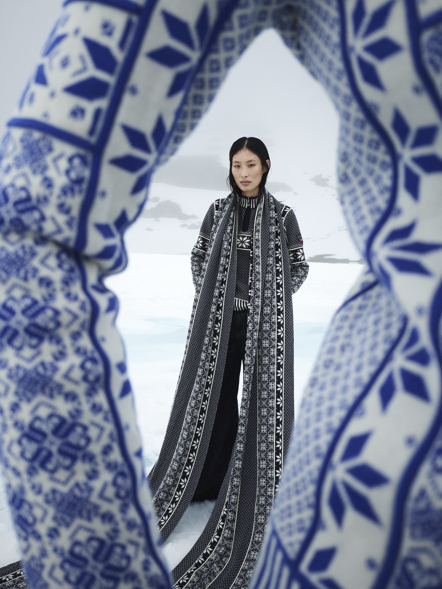 Female Model wearing a Dale of Norway sweater in black and white